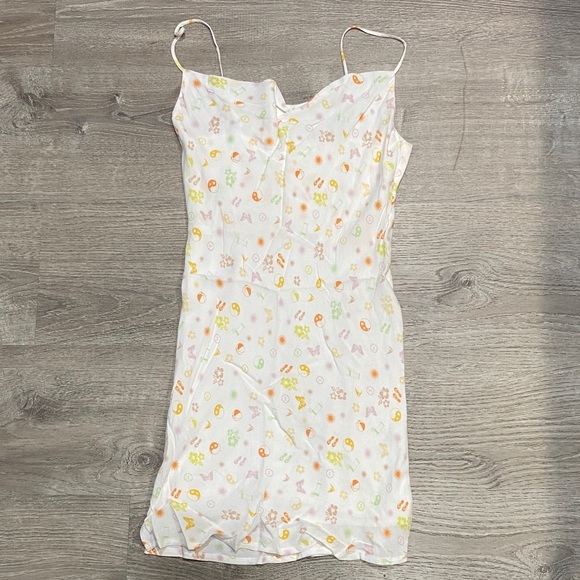 Elodie Dresses & Skirts - Elodie White Floral Mini Dress